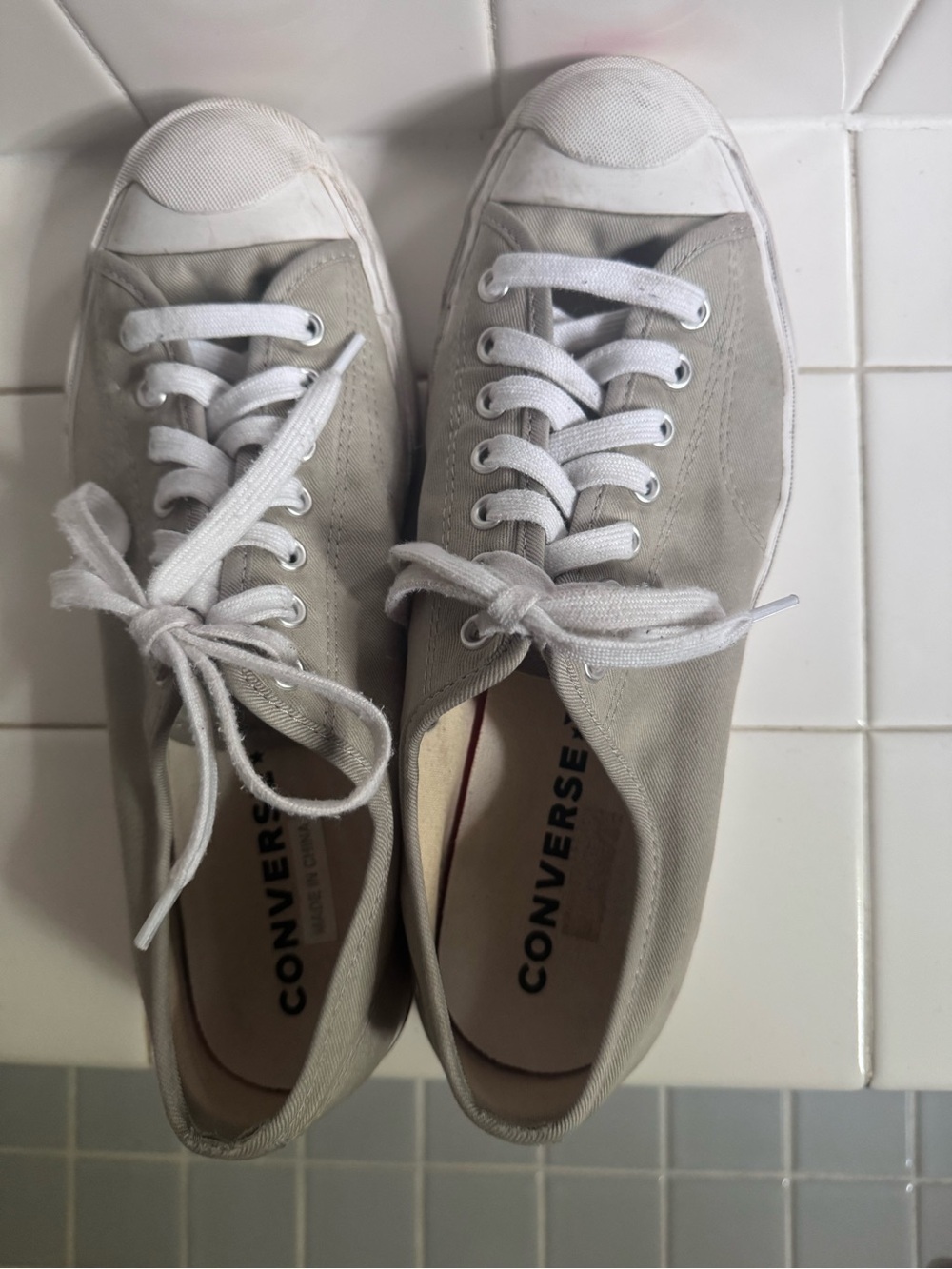 Jack Purcell Converse Low-Top Canvas Sneakers in Light Gray and White.